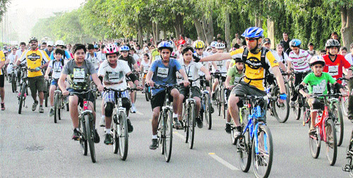 Schoolchildren participate in an awareness cycle rally against pollution at the Leisure Valley park in Gurgaon.