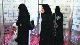 Students visit the philatelic exhibition at Government College for Women in Srinagar on Monday. 