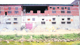 A new building being raised at the site where Shital Fibres factory had collapsed last year in Jalandhar.