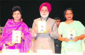 Union Minister Kumari Selja, Daljit Singh Grewal, CSCA chief, and Madhu Bansal, Railway Minister Pawan Kumar Bansals wife, at a function in Chandigarh on Tuesday. 