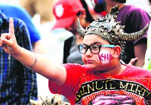A supporter of Kings XI Punjab reacts to the fall of Adam Gilchrists wicket during a match against Kolkata Knight Riders at the PCA Stadium, Mohali, on Tuesday.