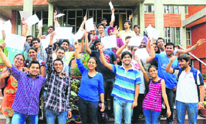 Students of the PEC University of Technology in a jubilant mood after receiving appreciation certificates from the UT police in Chandigarh on Tuesday.