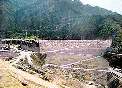 A view of the main dam of the 800-MW Kol Dam hydroelectric project at Sundernagar on the border of Mandi and Bilaspur districts