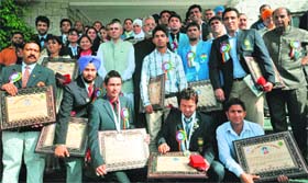Chief Minister Omar Abdullah with sportspersons in Jammu on Tuesday
