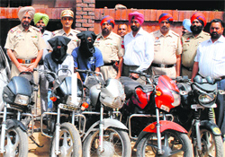 The CIA staff with two thieves and vehicles recovered from them in Jalandhar on Tuesday.