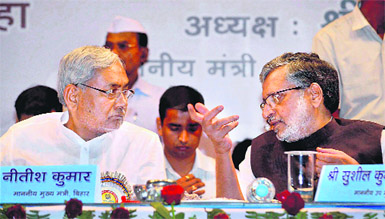 Bihar Chief Minister Nitish Kumar and his deputy Sushil Kumar Modi at a function in Patna on Tuesday.