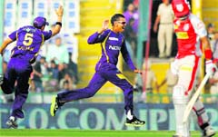 Kolkata Knight Riders Sunil Narine exults after taking a wicket on Tuesday.  PTI