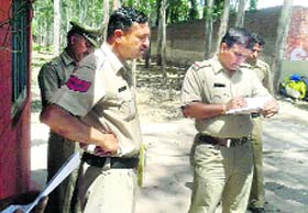 Police officials at the spot where the youth was stabbed in Panchkula on Wednesday