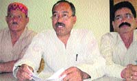Jan Sangharsh Morcha president Raghunath Singh Negi addresses mediapersons in Dehradun on Wednesday.