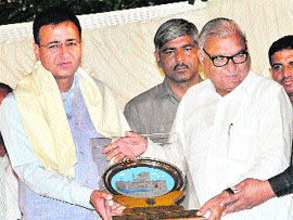 Randeep Singh Surjewala gets the best legislators award at a function in Haryana Bhawan, Chandigarh, on Wednesday.