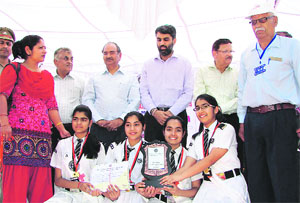 Mahender Kumar, secretary to Haryana Governor (third from left), and Deputy Commissioner Mandeep Singh Brar (fourth from left) with the winning cadets at the 21st state-level ambulance competitions at Punjabi Dharamshala in Kurukshetra on Wednesday. 