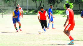 Players in action during a football match