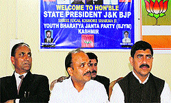 BJP national secretary Anil Jain and state president Jugal Kishore at a party function in Srinagar on Wednesday