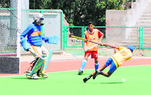 Budding hockey players during the trial at GNDU in Amritsar on Thursday. 