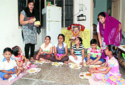 On the occasion of Ashtami, a family performing kanjak pujan in Bathinda on Thursday