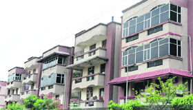 Balconies of flats covered with glazing in violation of building bylaws at a society in Sector 50, Chandigarh.