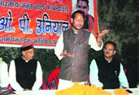 State BJP chief Teerath Singh Rawat addresses the media in Mussoorie on Thursday.