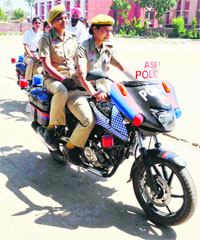 Newly recruited policewomen being imparted training in driving motorbikes at the Civil Line area in Amritsar. 