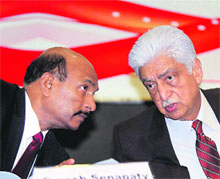 Wipro chairman Azim Premji (R) with chief financial officer Suresh Senapaty during the announcement of the companys financial results in Bangalore on Friday
