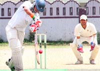 A batsman in action during a match in the 61st Dehradun District Cricket League in Dehradun on Friday. Tribune photo: Vinod Pundir