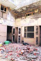 The broken terrace of the house which fell down resulting in the death of a young woman. 