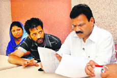 The parents of the rape victim give their complaint to Vice-Chairman of the National Commission for SC Raj Kumar Verka at Jalandhar on Friday.