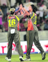 Sunrisers Hyderabad bowler Ishant Sharma celebrates after taking the wicket of Mandeep Singh in Hyderabad on Friday. 