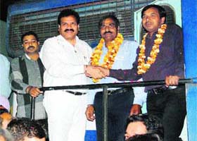 Passengers from the Amritsar-Chandigarh Superfast Express being received at the Amritsar railway station on Friday night