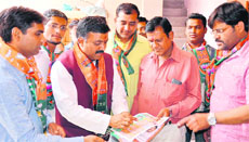 BJP candidate Manoj Garg during his election campaign at Kankhal in Haridwar on Saturday.