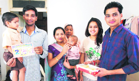Purshottam Bansal and Priyanka (left) with their two daughters and other family members after they won Rs 1 crore in lottery at Kalanwali in Sirsa on Saturday.