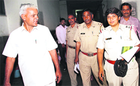 Policemen come out of the PGIMS, Rohtak, after medical examination of the NRI woman who was allegedly raped on Saturday.