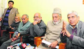 PDP leaders address a press conference at the party headquarters in Srinagar on Saturday