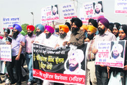 Activists of Sikh Students Federation (Mehta) hold a peace march in Amritsar on Saturday.