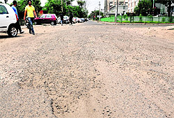 Damaged road in Industrial Area, Phase VIII