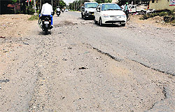 Damaged roads in Industrial Area, Phase VII, and Industrial Area, Phase II in Mohali