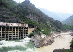A view of the silt-containing Sutlej at Slapper on the border of Mandi and Bilaspur districts