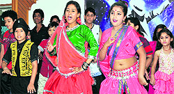 Children perform an item during a dance competition organised by Pooja Kala Sangam at KL Saigal Hall, Abhinav Theatre, in Jammu on Sunday