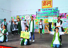 Students present a skit based on earth conservation at DAV Centenary Public School, Jagjeetpur, in Haridwar on Monday.