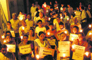 Residents of Gurgaon hold a candlelight march to protest against the rape of a five-year-old girl, in New Delhi. 