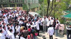 Doctors raise slogans as they strike work demanding security in hospitals in Shimla on Monday. Photo: Amit Kanwar