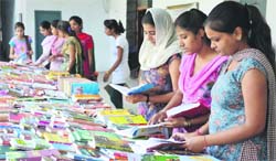 Students attend the book fair at Government College for Girls in Amritsar on Tuesday. Photo: Vishal Kumar