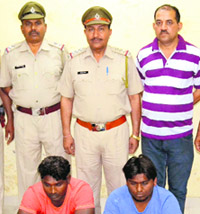 The accused in police custody.