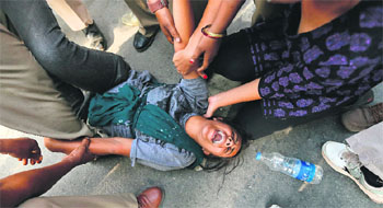 Police detain a supporter of the Aam Aadmi Party during a protest in front of the Prime Ministers residence. Angry crowds demonstrated in the Capital last week after a five-year-old girl was allegedly raped, tortured and kept in captivity for 40 hours. Reuters