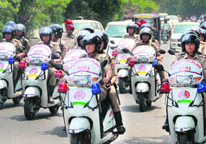 Women constables ride Activa scooters in a rally taken out in Jalandhar on Tuesday. 