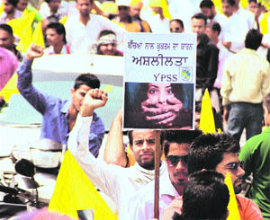 Activists of the Yuva Parivaar Sewa Samiti take out a rally as a mark of protest against the Delhi rape incident in Jalandhar on Tuesday. 