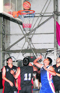 Players in action during the Western Air Command Inter Area Basketball Championship 2013-4 at Air Force Station, Adampur, on Tuesday. 