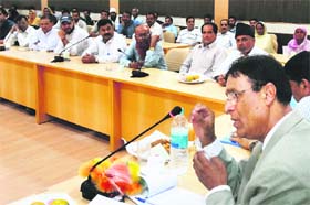 Minister for Consumer Affair and Public Distribution (CA&PD) and Transport, Mohammad Ramzan addressing a review meeting of officers at Reasi on Tuesday