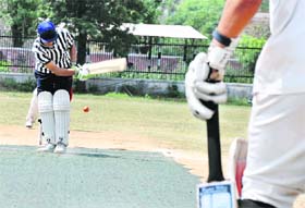 Players in action during the inter-department cricket tournament at the University of Jammu on Tuesday