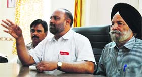 Northern Railwaymen Union secretary Daljit Singh addresses a press conference in Ludhiana on Tuesday