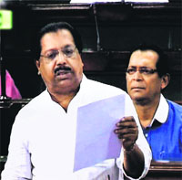 Congress MP and chairman of the JPC probing the 2G spectrum case PC Chacko speaks in the Lok Sabha in New Delhi on Tuesday